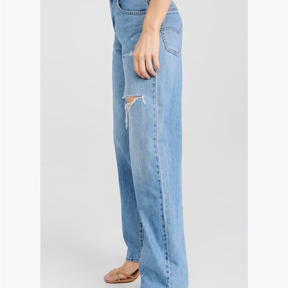 Women's Light Blue Distressed Jeans